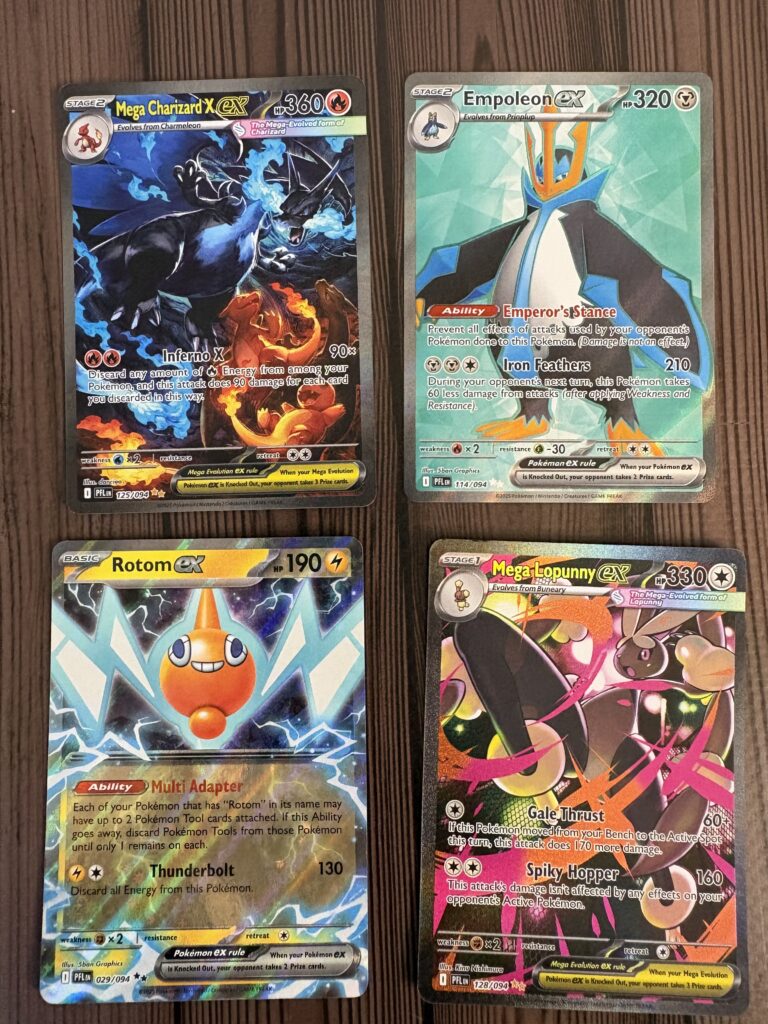 Mega Charizard X ex SIR oraz inne karty z dodatku Phantasmal Flames